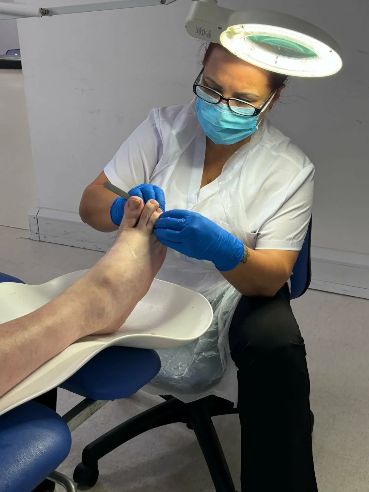 Marianna, Level 4 Foot Health Practitioner, treating a client at Fairy Feet